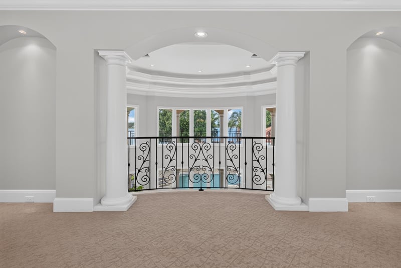 Upstairs sitting area with iron railing at 344 Broward Rd, Jacksonville, FL