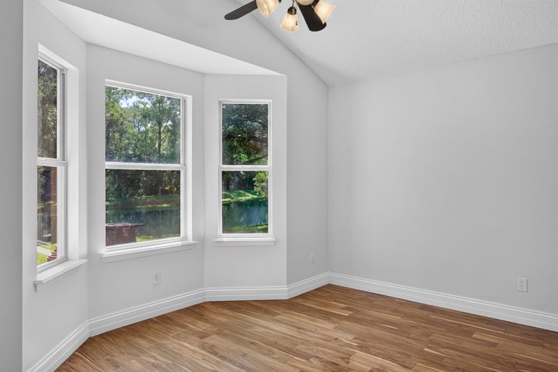 Bay-windowed dining nook overlooking the yard at 11675 Magnolia Estates Rd, Jacksonville, FL 32223