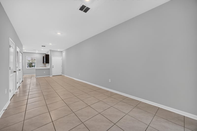 Hallway view toward living area with tile floor at 2837 Black Buck Cir, Jacksonville, FL 32225