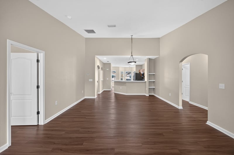 Open floor plan view through arched doorways at 3750 Silver Bluff Blvd, Orange Park, FL