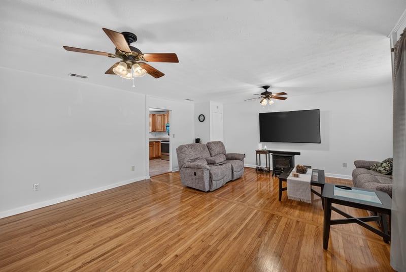 Living room with ceiling fan and sofa at 1847 Grove Park Dr, Orange Park, FL