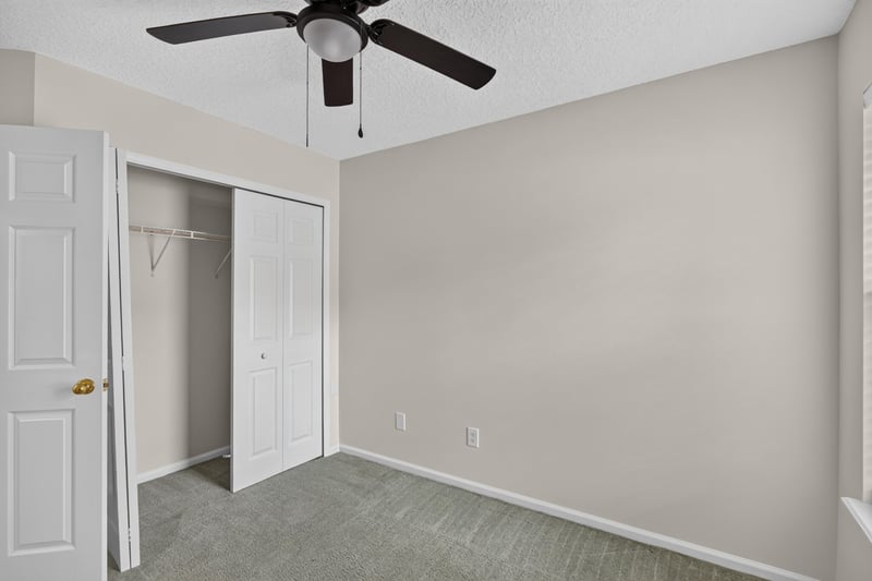 Bedroom with closet and ceiling fan at 605 N Covered Bridge Rd, Jacksonville, FL