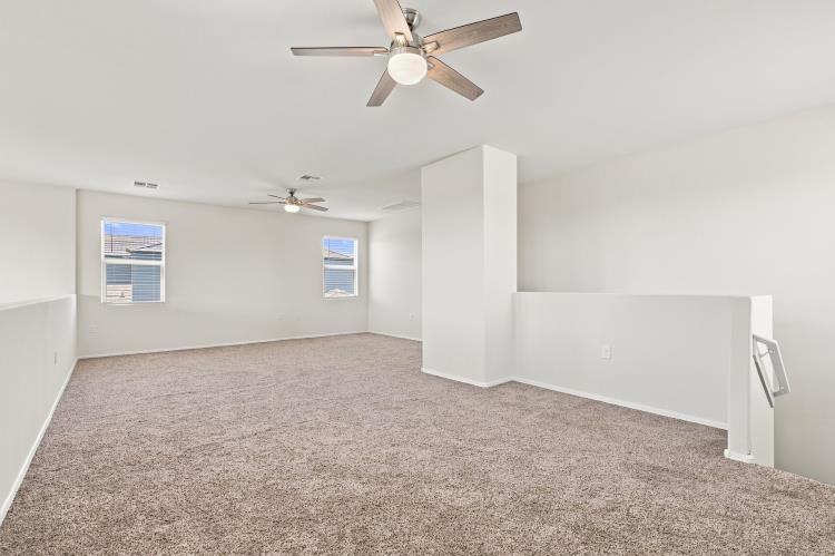 Loft set up as a casual lounge, empty