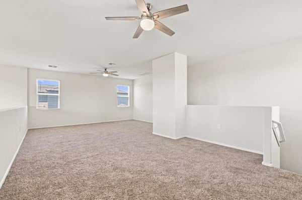 Loft set up as a casual lounge, empty