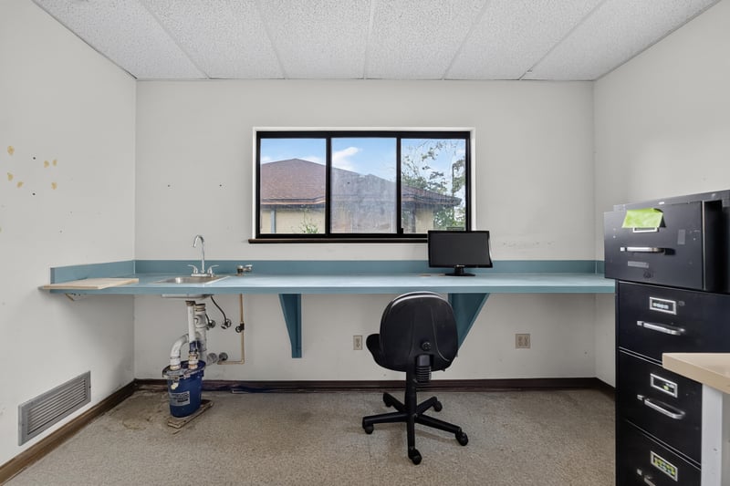 Room with sink counter, window and file cabinets at 1543 Kingsley Ave #19, Orange Park, FL 32073