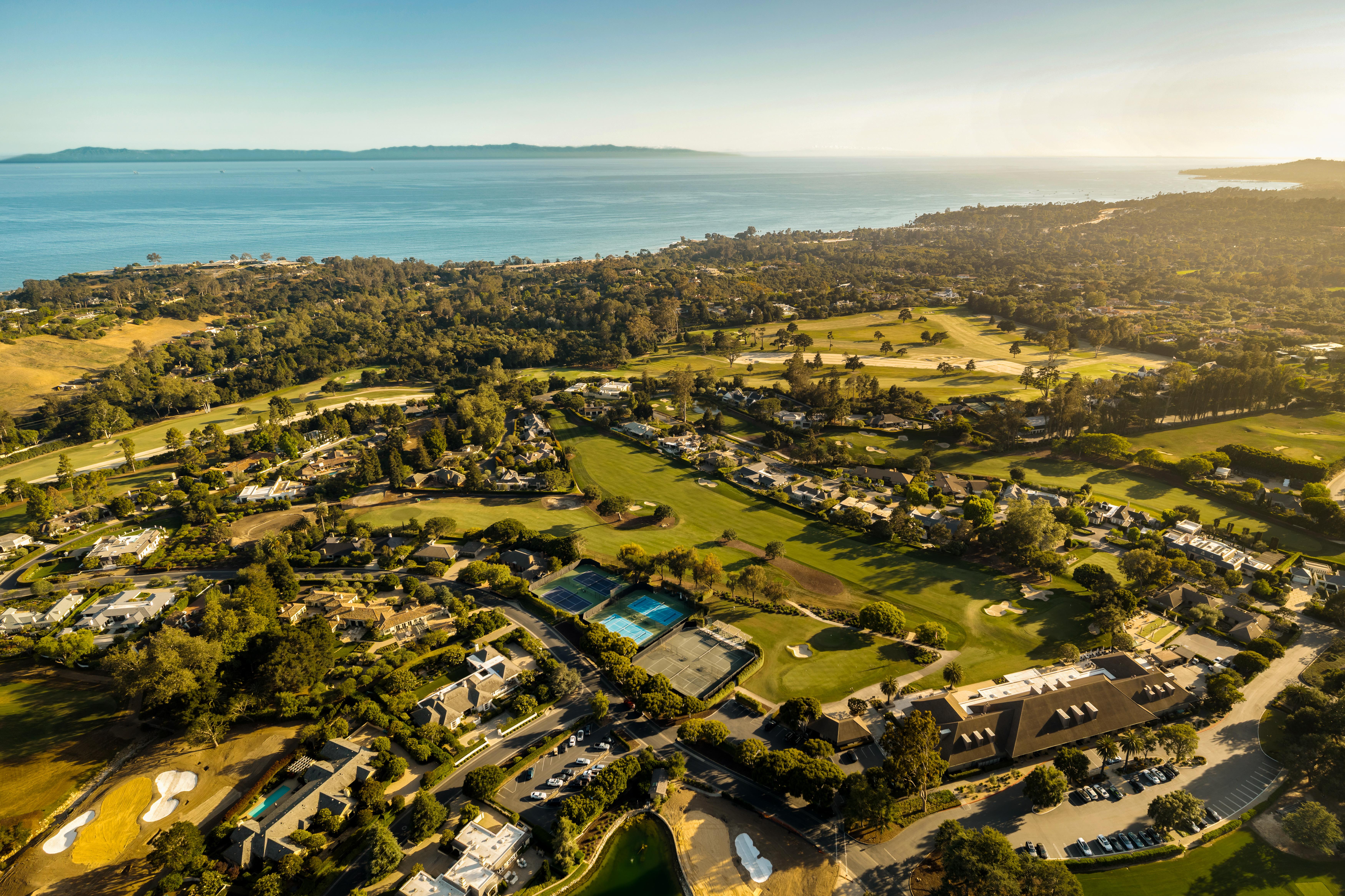 Real estate drone photography above the Carpinteria bluffs corridor — aerial perspective of 468 Crocker Sperry Dr, Montecito estate grounds and surrounding landscape by VirTour Media. Our team captured aerial photography, a luxury property video, FPV video tour, Matterport 3D virtual tour, and 2D floor plan throughout the morning.