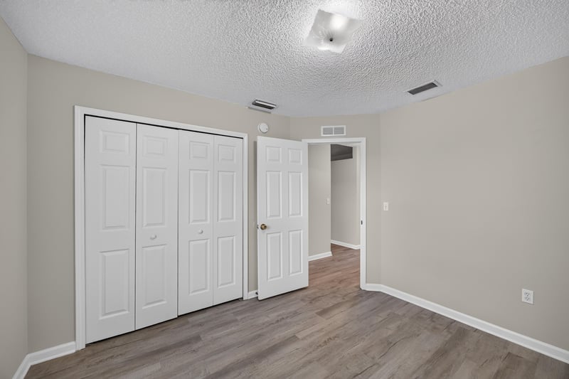 Bedroom with closet and hallway view at 8519 Blazing Star Ct, Jacksonville, FL 32210