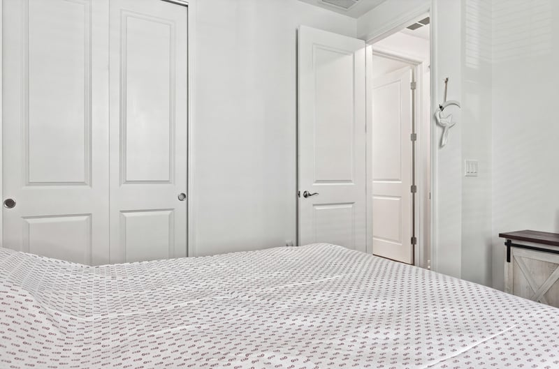 Bedroom with closet doors, photographed by Megapixeler on Torres Trace, St. Augustine