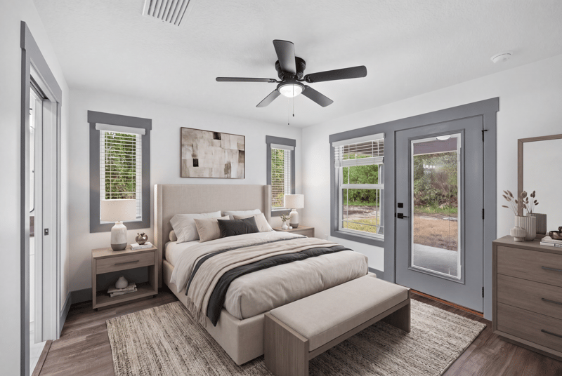 Bedroom staged with bed at 4800 Acacia St, Middleburg, FL 32068