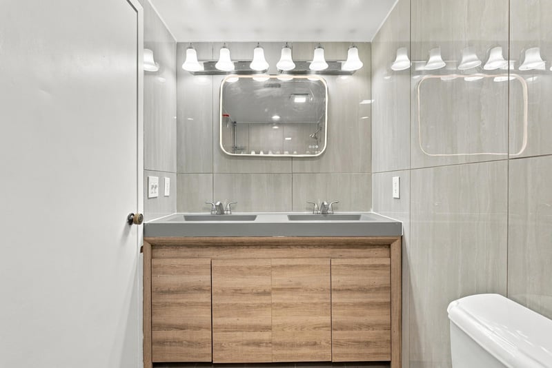 Bathroom with double-sink vanity at 7703 Las Palmas Way