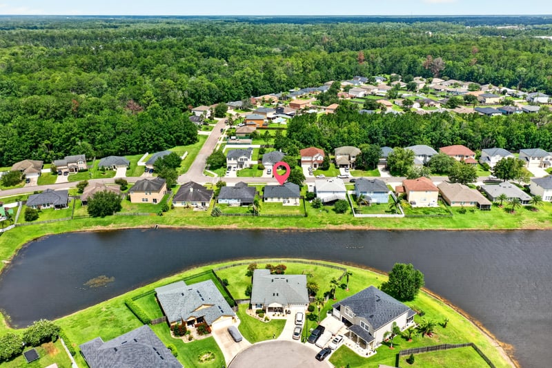 Aerial view of pond and surrounding homes in Middleburg