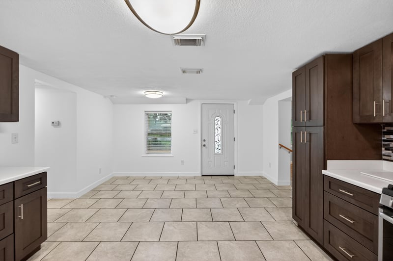 Kitchen pantry cabinets and tile flooring at 1619 Hammond Blvd, Jacksonville, FL