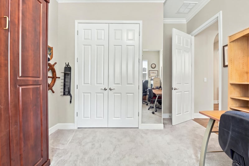 Hallway with closet doors, photographed by Megapixeler on Lucena Ln, Jacksonville, FL