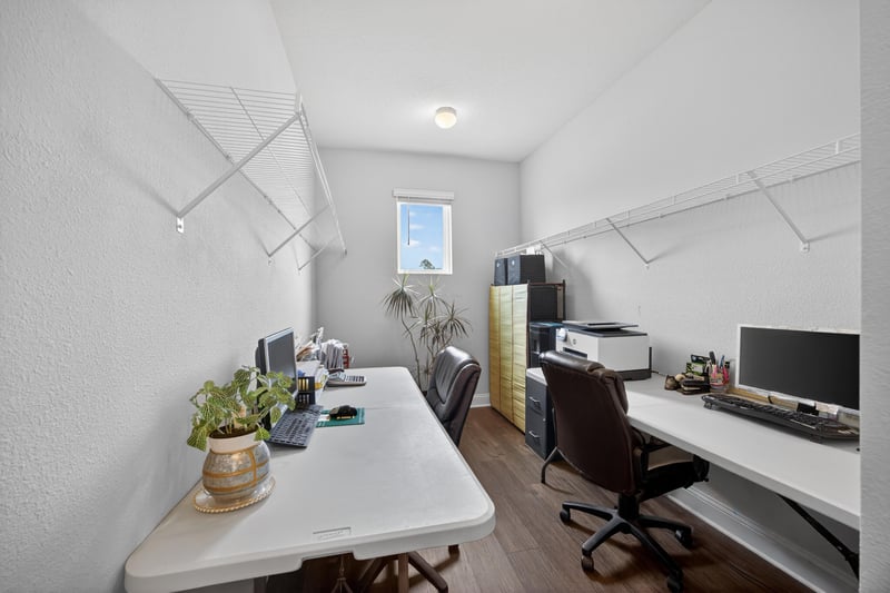 Home office with desk and chair at 85491 Fall River Pkwy, Fernandina Beach, FL 32034