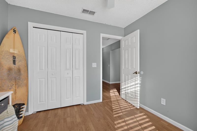Closet with surfboard storage at 4556 Shaky Leaf Ln N, Jacksonville, FL 32224