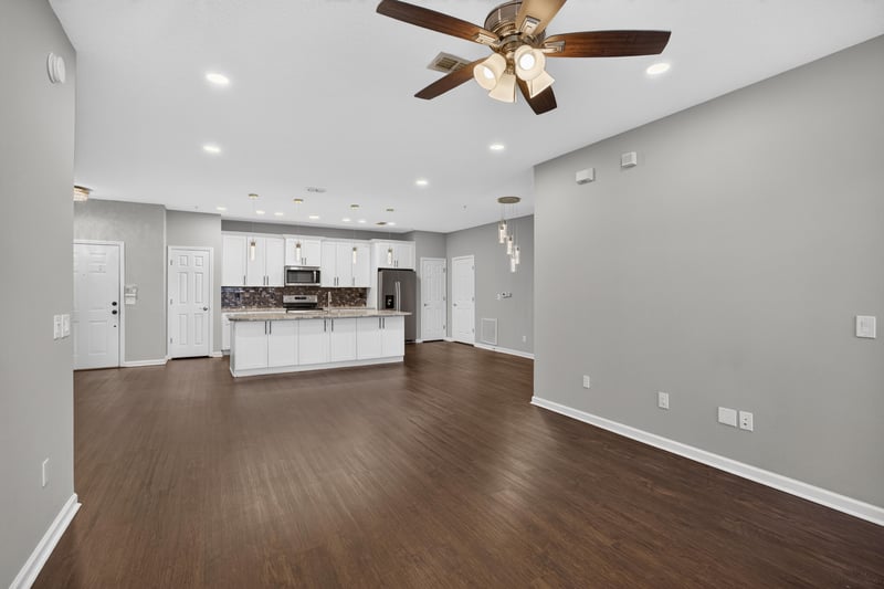 Open living room and kitchen view at 11251 Campfield Dr unit 4209, Jacksonville, FL 32256