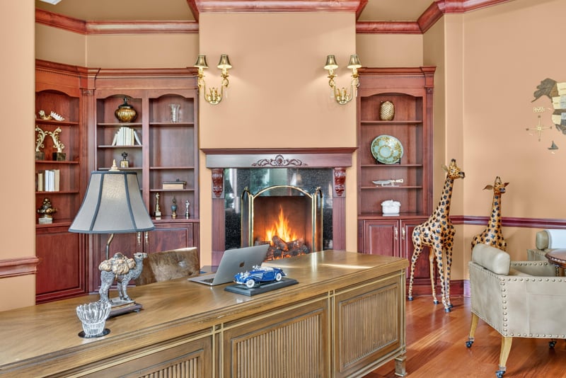 Office with built-in shelving and fireplace at 344 Broward Rd, Jacksonville, FL