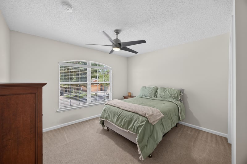 Bedroom with carpet flooring and a window view at 3660 Middlebrook Dr, Orange Park, FL 32065