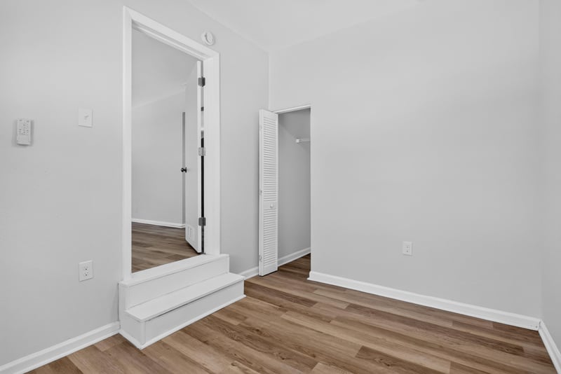 Room with doorway and wood-look flooring at 855 Cornwallis Dr, Jacksonville, FL