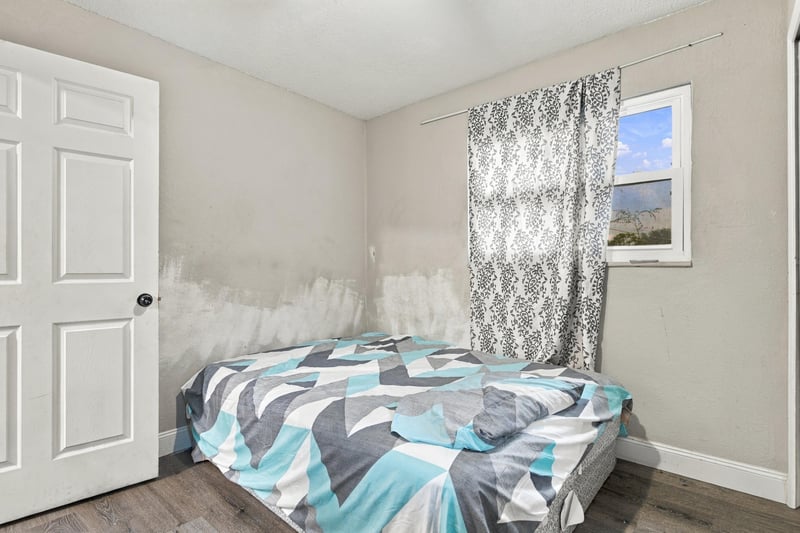 Bedroom with bed and natural window light at 357 Dillon Dr, Orange Park, FL