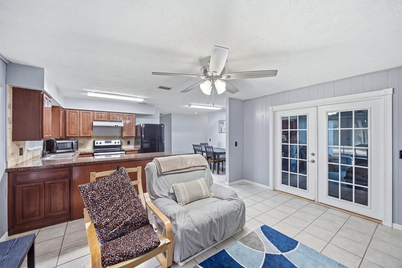Kitchen with french doors and breakfast nook at 417 Capricorn Ln, Orange Park, FL 32073