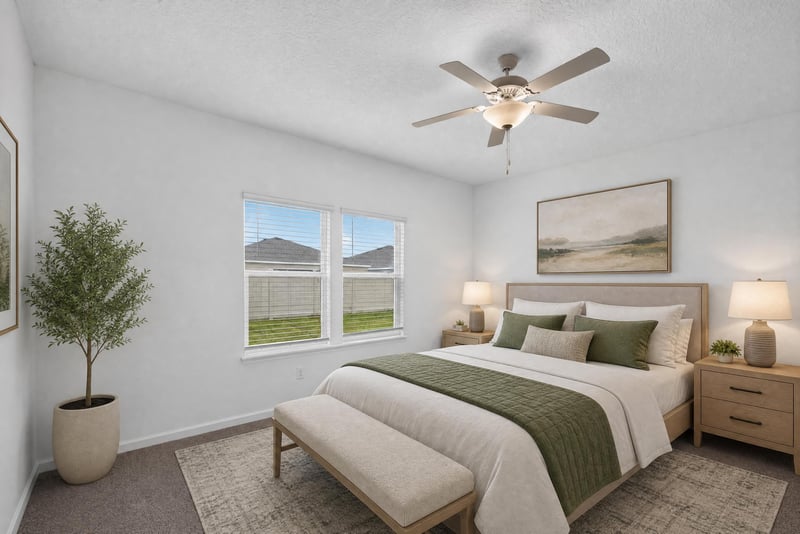 Bedroom with ceiling fan and window, virtually staged at 9905 Ansley Lake Dr, Jacksonville, FL