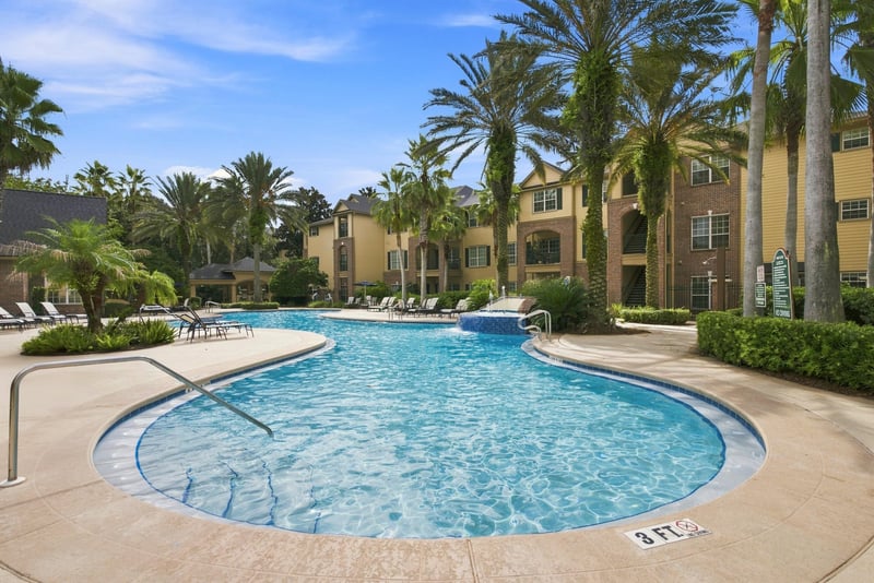 Community pool deck in Reserve at Point Meadows