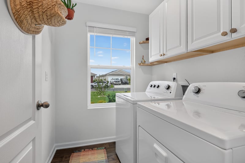 Laundry room with window at 4276 Quaking St, Jacksonville, FL 32218