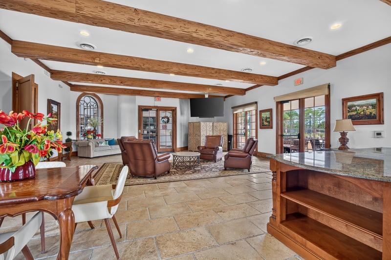Clubhouse lounge with leather chairs in Murabella
