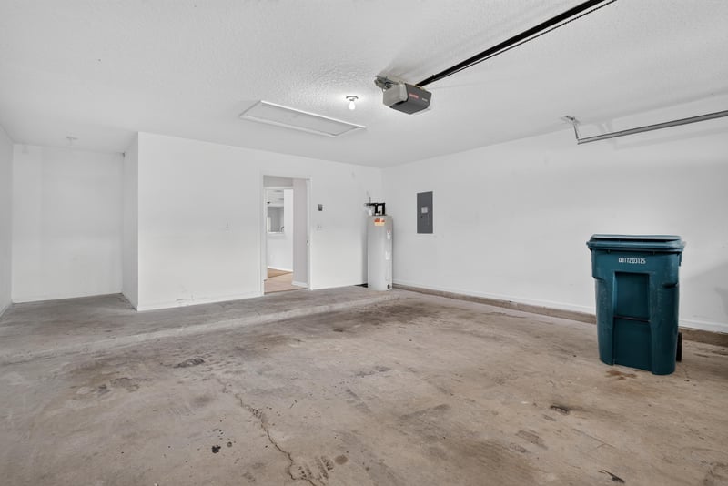 Garage interior with electrical panel at 11669 Collins Creek Dr, Jacksonville, FL 32258