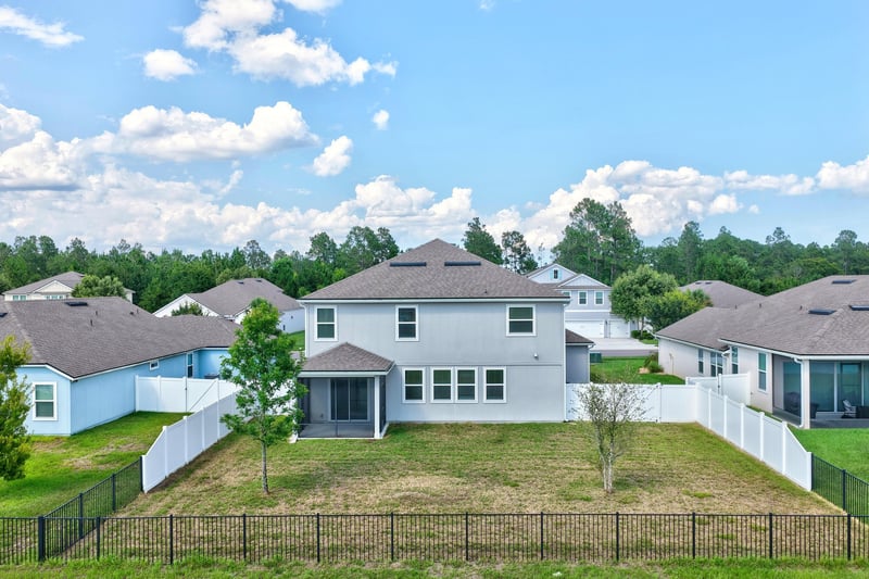 Aerial view of backyard and fenced yard at 2580 Cold Stream Ln, Green Cove Springs, FL 32043