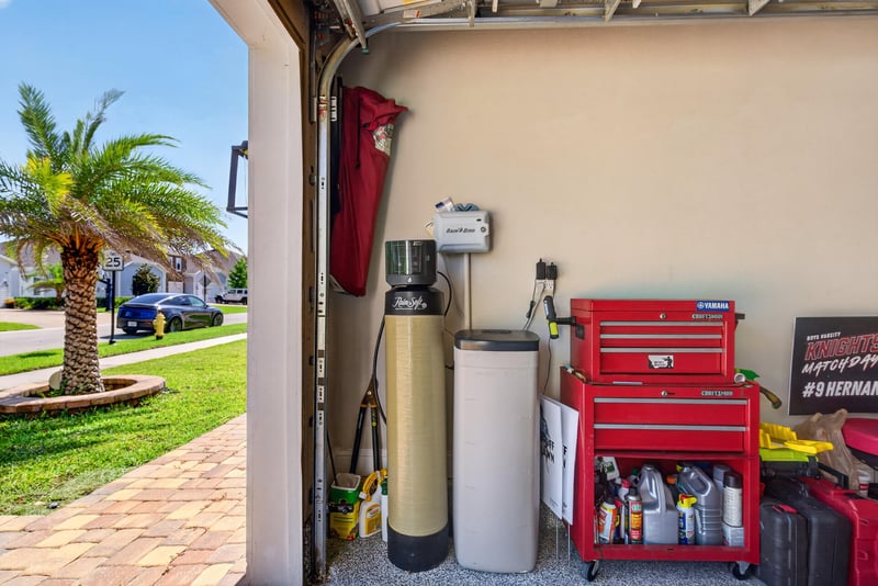 Garage with water heater and tool chest at 22 Azura Point