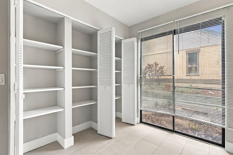 Pantry shelving near sliding glass door at 7703 Las Palmas Way