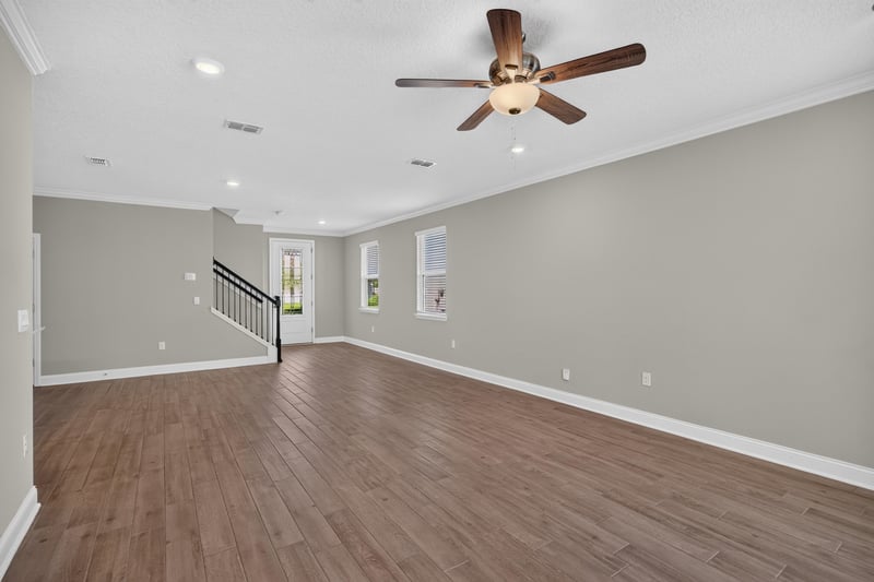 Open living space with staircase railing at 331 Millerstone Dr, St. Augustine, FL 32092