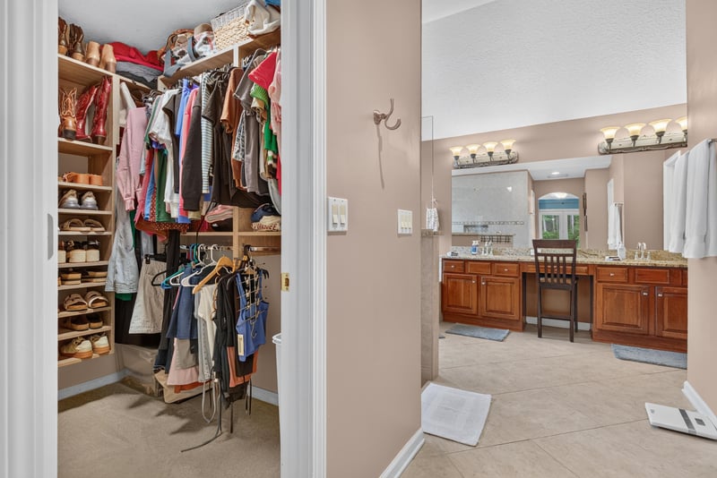 Walk-in closet with shelving at 2304 Spring Hill Ct, Orange Park, FL