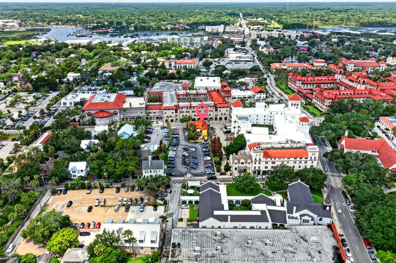 Aerial view of downtown streets and rooftops in St. Augustine, FL