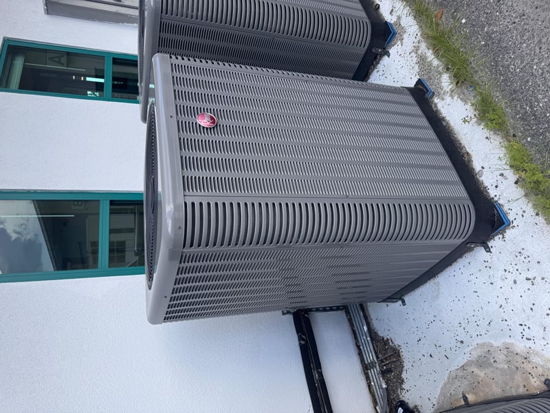 Condenser unit with fan and side vents at 11700 New Kings Rd, Jacksonville, FL 32219