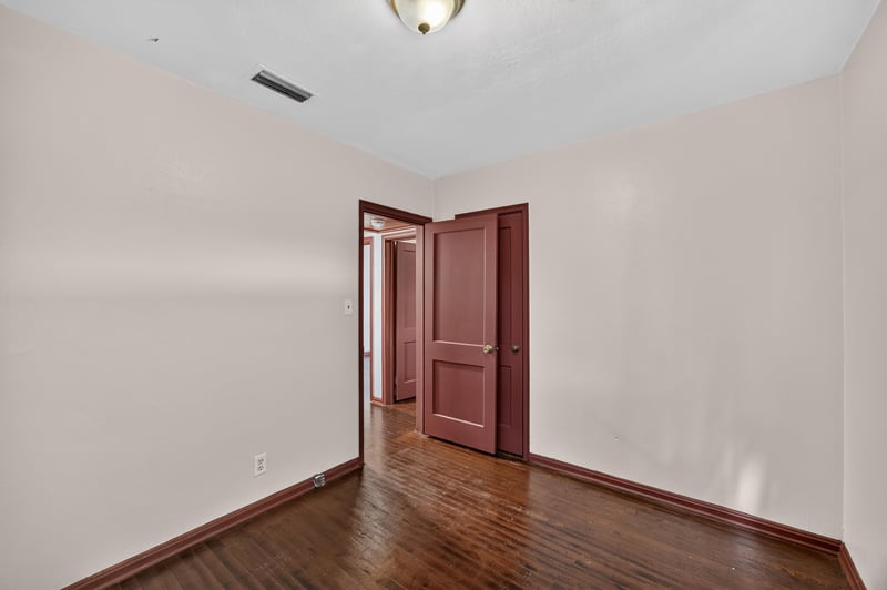 Empty room with red trim door at 2132 Allandale Cir W, Jacksonville, FL