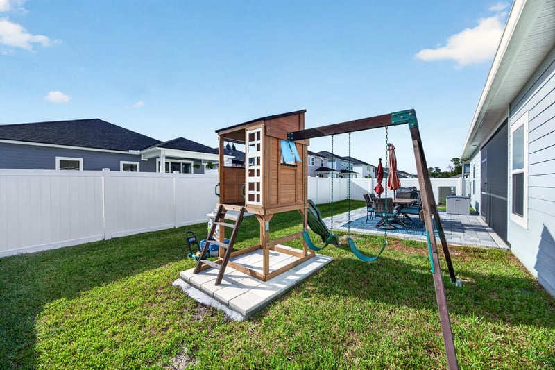 Backyard play set and grass yard at 2354 Jennings Farm Dr, Middleburg, FL 32068