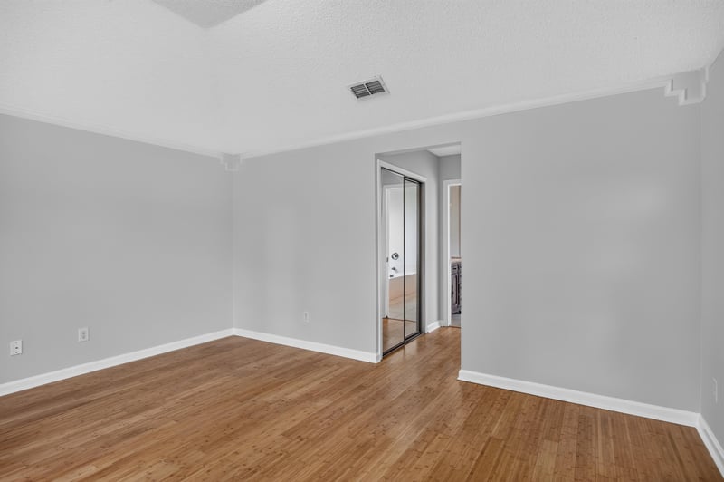 Hallway with wood flooring at 456 Bay Point Way N, Jacksonville, FL 32259