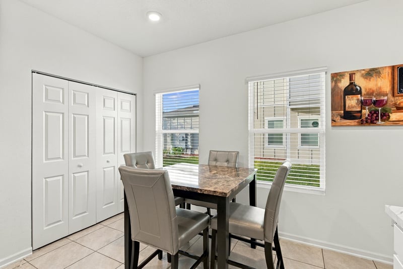 Dining area with table and chairs, photographed by Megapixeler on Haymon Ave, Jacksonville