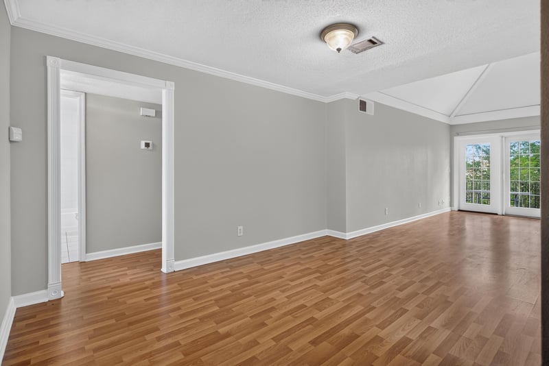 Room with French doors and wood floor at 3866 Campenero Ct unit 6, Jacksonville, FL 32217