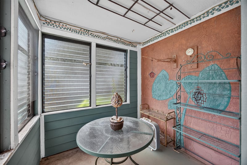 Screened porch with blinds at 4837 Pareja Ct, Jacksonville, FL 32225