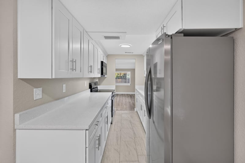 Kitchen view toward hallway, photographed by Megapixeler on Susie St, Jacksonville