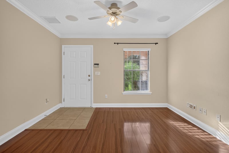Empty room with window and hardwood floors at 353 Redwood Ln