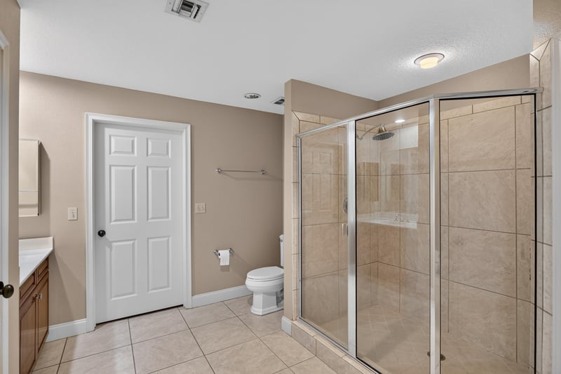 Bathroom with glass shower and double vanity at 1478 Riverplace Blvd 1904, Jacksonville, FL 32207