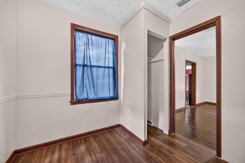 Hallway with window and red trim doors at 2132 Allandale Cir W, Jacksonville, FL