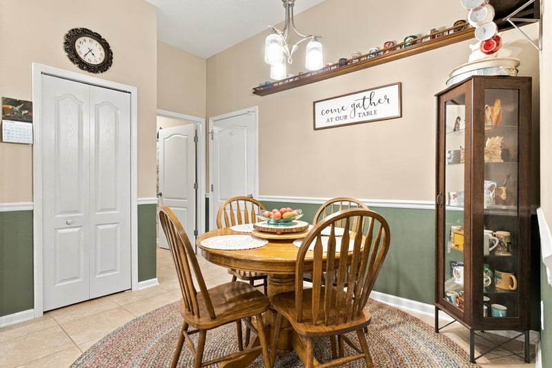 Breakfast nook with round table and chairs at 10923 Black Diamond Ct, Jacksonville, FL