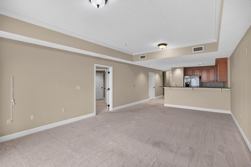 Living room open to kitchen pass-through at 1478 Riverplace Blvd 1904, Jacksonville, FL 32207