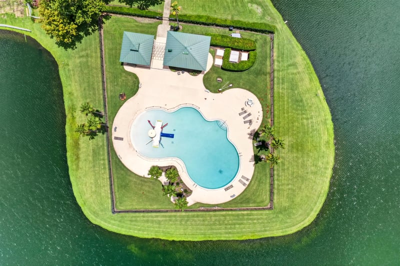 Aerial view of the community pool and patio area in Windsor Chase